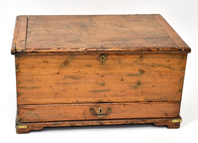 Lot 1495 - An old pine blanket chest with single base...