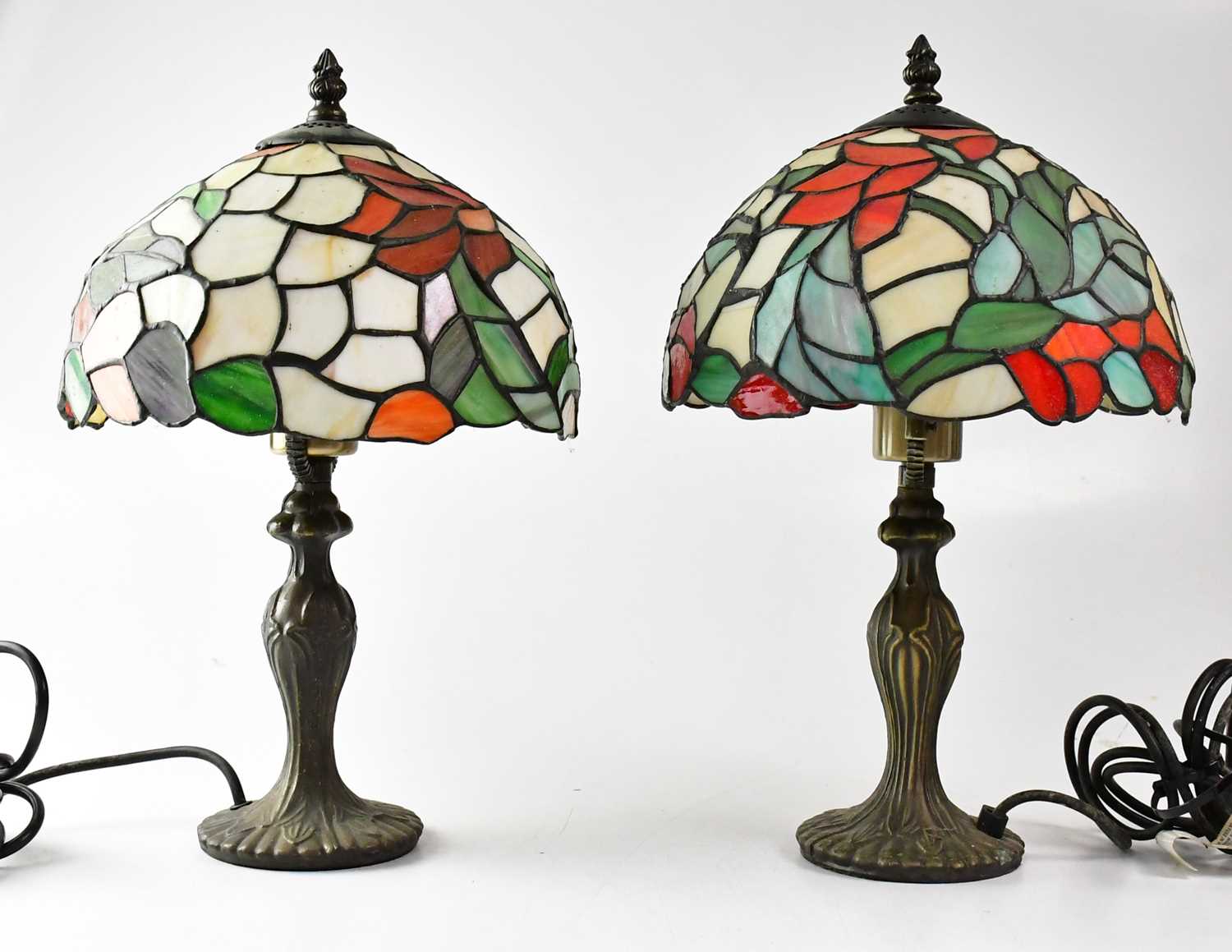 Lot 98 - A pair of Tiffany-style leaded stain glass...