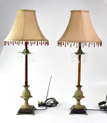 Lot 93 - A pair of metal table lamps with columns in...