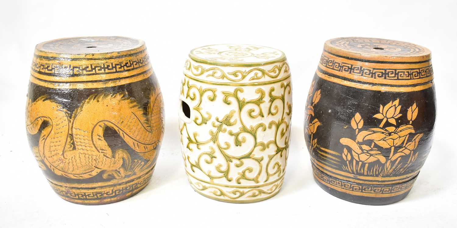 Lot 80 - A pair of Chinese brown glazed garden stools...