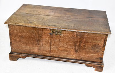 Lot 1501 - An 18th century oak blanket chest with hinged...
