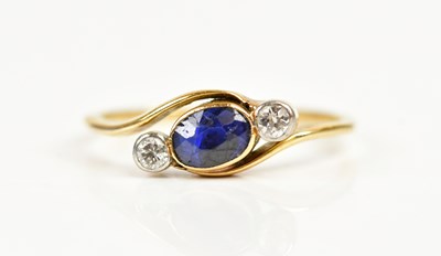 Lot 116 - A yellow metal diamond and sapphire three...