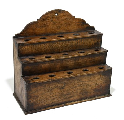 Lot 104 - A George III style stepped oak spoon rack,...