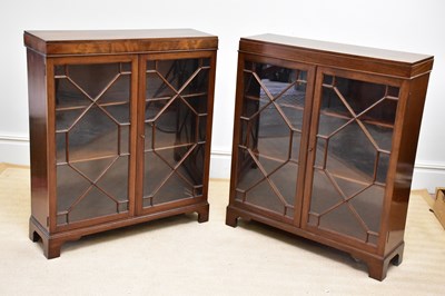 Lot 194 - A pair of Waring & Gillow mahogany bookcases,...