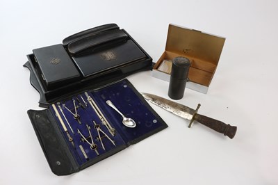 Lot 560 - A white metal mounted ebony dressing table set,...