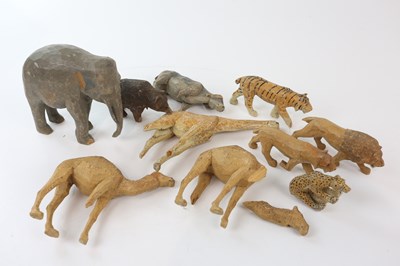 Lot 703 - A collection of ten early 20th century carved...