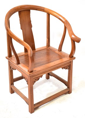 Lot 7 - A modern Chinese hardwood horseshoe back chair,...