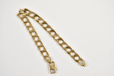 Lot 2490 - A 9ct yellow gold square curb bracelet, approx...