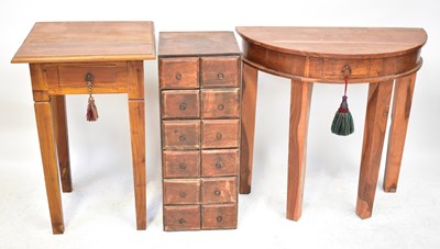 Lot 4 - A collection of teak and hardwood furniture...