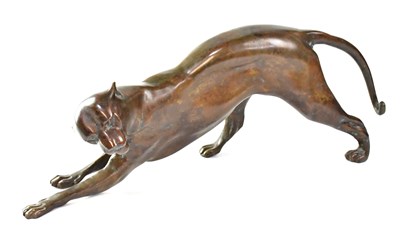 Lot 297 - UNATTRIBUTED; a bronze figure of a large cat,...