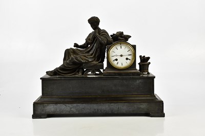 Lot 388 - A Victorian figural mantel clock representing...