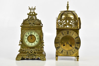 Lot 389 - A reproduction brass lantern type mantel clock,...