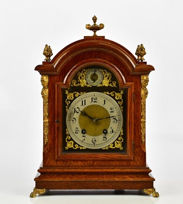 Lot 371 - An early 20th century oak mantel clock with...