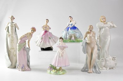 Lot 269 - ROYAL DOULTON; seven female figurines...