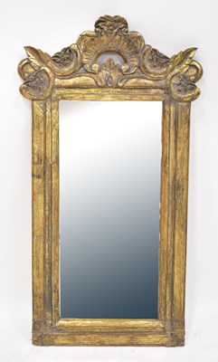 Lot 77 - An Eastern carved gilt painted wooden...