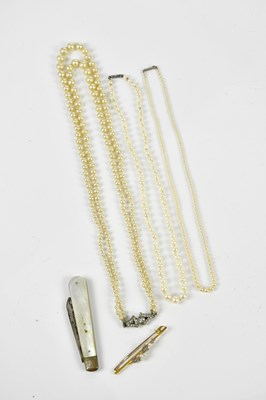 Lot 2509 - A Victorian yellow metal seed pearl set bar...
