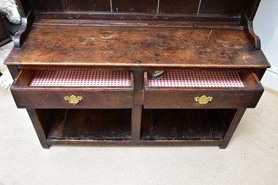Lot 3 - A George III oak dresser, with plate rack...