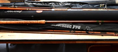 Lot 822 - A large quantity of fishing rods and cases to...