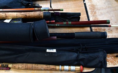 Lot 822 - A large quantity of fishing rods and cases to...