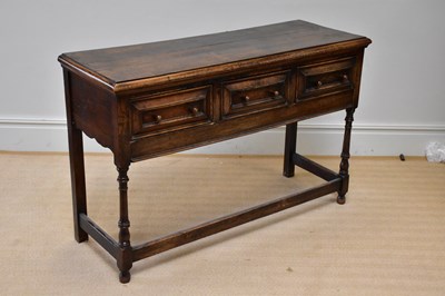 Lot 12 - An 18th century style oak dresser base with...