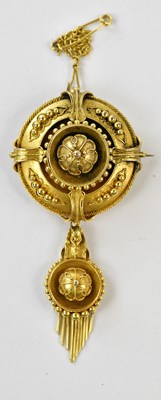 Lot 2501 - A Victorian yellow metal target brooch/pendant...