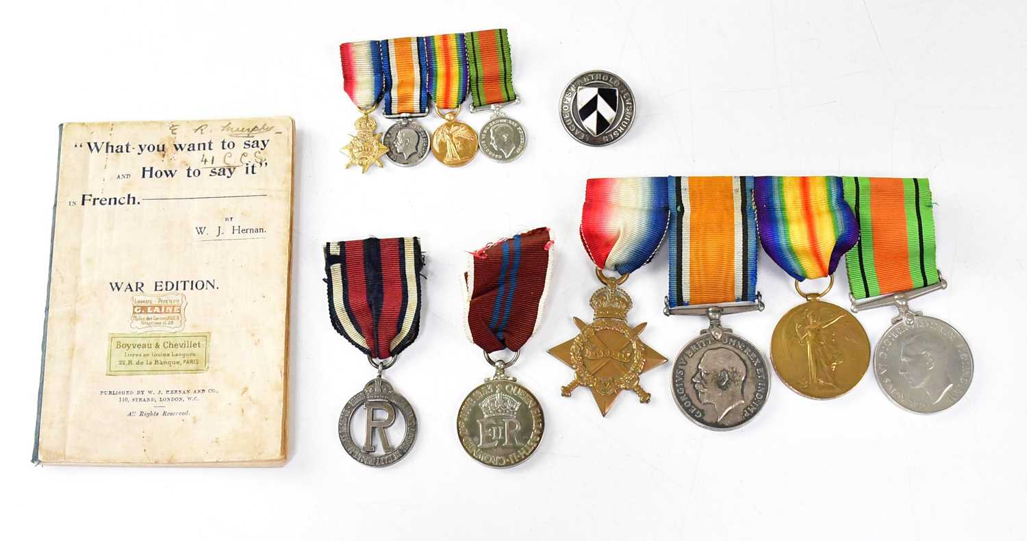 Lot 610 - A WWI Nursing medal group awarded to Sister E....