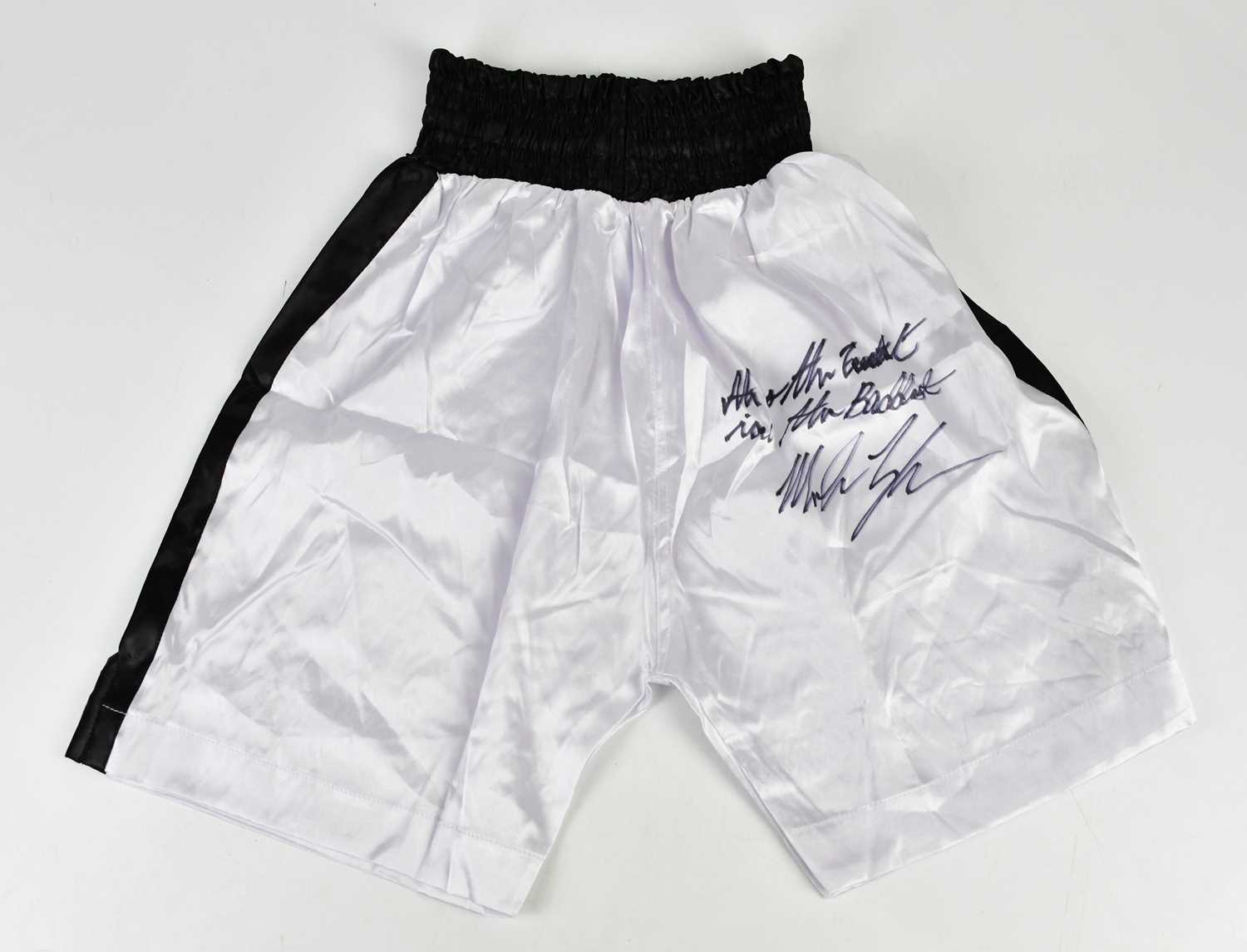 Lot 2717 - MIKE TYSON; a pair of signed white and black...