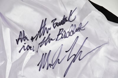 Lot 2717 - MIKE TYSON; a pair of signed white and black...