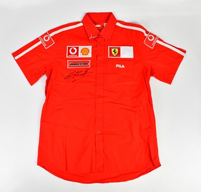 Lot 2722 - MICHAEL SCHUMACHER; a signed FILA Ferrari...