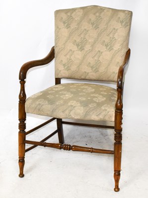 Lot 1602 - A 19th century open sided armchair on turned...