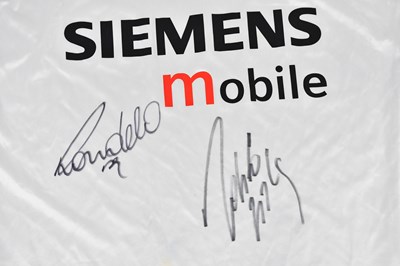 Lot 2670 - REAL MADRID; a signed 2004 football shirt,...