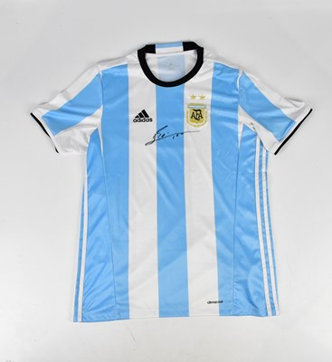 Lot 2671 - LIONEL MESSI; a signed Argentina football...