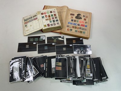 Lot 176 - Two stamp albums and a quantity of world stamps.