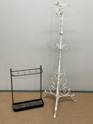 Lot 123 - An adjustable painted wrought iron floor lamp,...