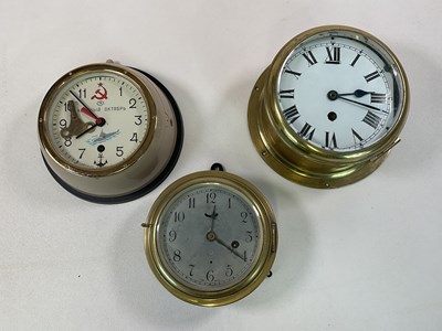 Lot 527 - Three brass ship's clocks including a Russian...