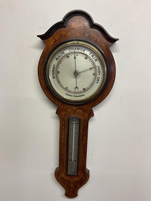 Lot 518 - An inlaid mahogany Aneroid Barometer; H; 68cm.