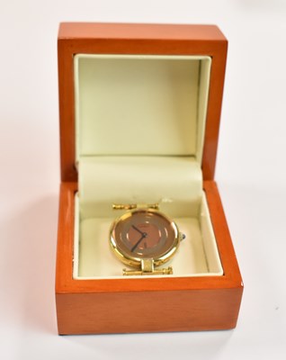 Lot 511 - CARTIER; a Must de Cartier lady's silver watch...