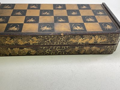 Lot 22 - A 19th century lacquered Chinoiserie detailed...