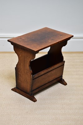 Lot 264 - A reproduction oak magazine rack/coffee table,...