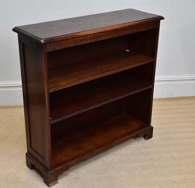 Lot 246 - A reproduction oak freestanding bookcase with...