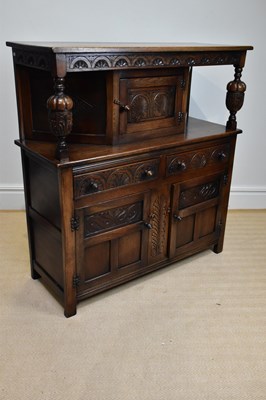 Lot 242 - A reproduction oak court cupboard, with single...