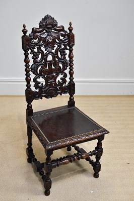 Lot 33 - An early 20th century carved oak Carolean...