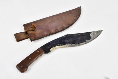 Lot 2564 - A wooden handled cutlass in leather scabbard.