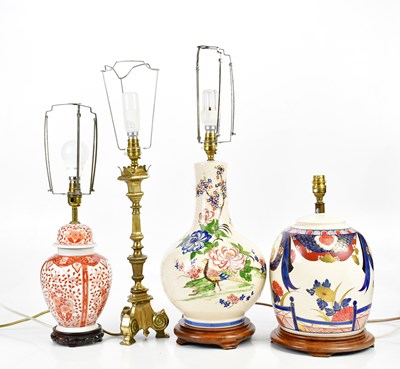 Lot 838 - Four decorative table lamps including a brass...