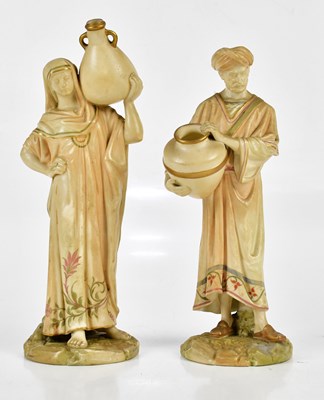 Lot 1550 - ROYAL WORCESTER; a pair of blush ivory figures,...