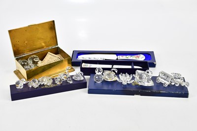 Lot 1582 - SWAROVSKI; a collection of crystal animals and...