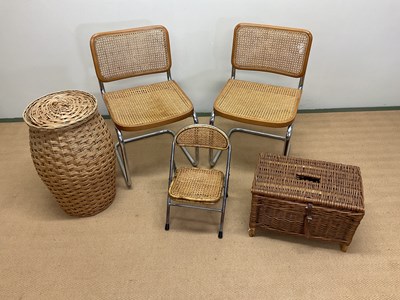 Lot 812 - A pair of chrome and rattan chairs in the...