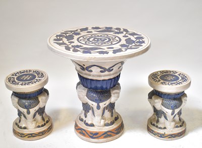 Lot 80A - A blue and white ceramic garden table, the...
