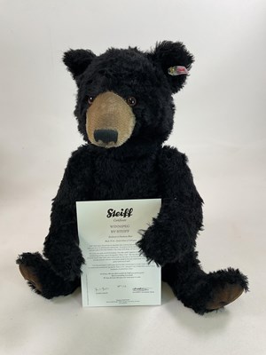 Lot 65 - STEIFF; a large black bear, white tag 664618...