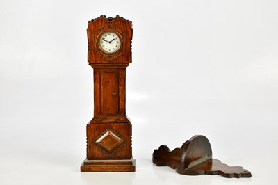 Lot 582 - An oak miniature longcase clock, the dial set...